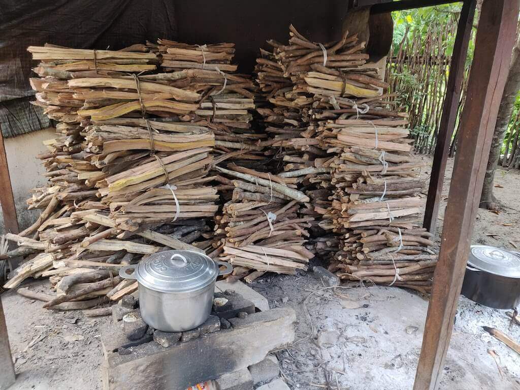A month's supply of firewood stacked up behind our rudimentary stove